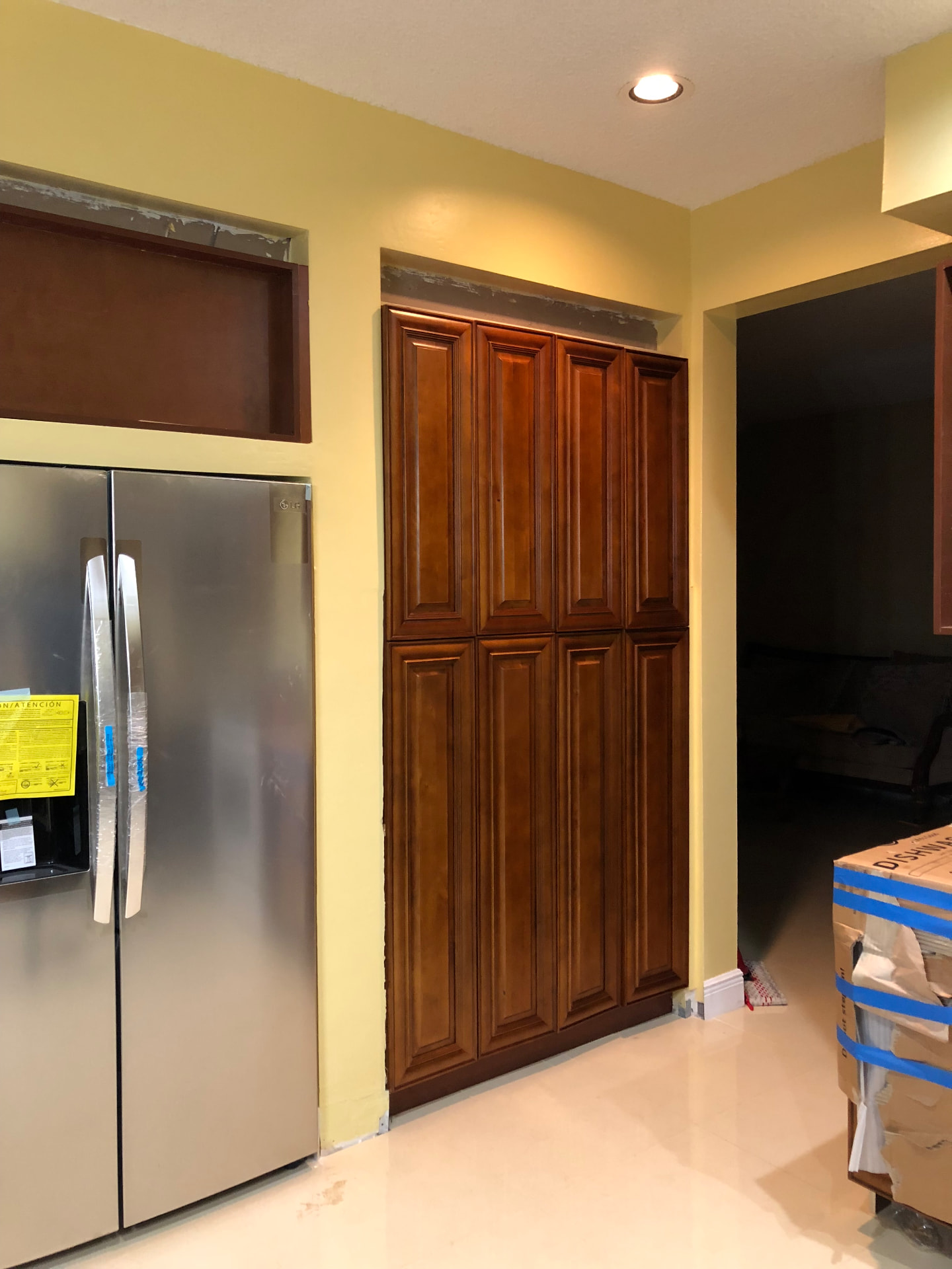 New pantry cabinetry installed during construction before final trim
