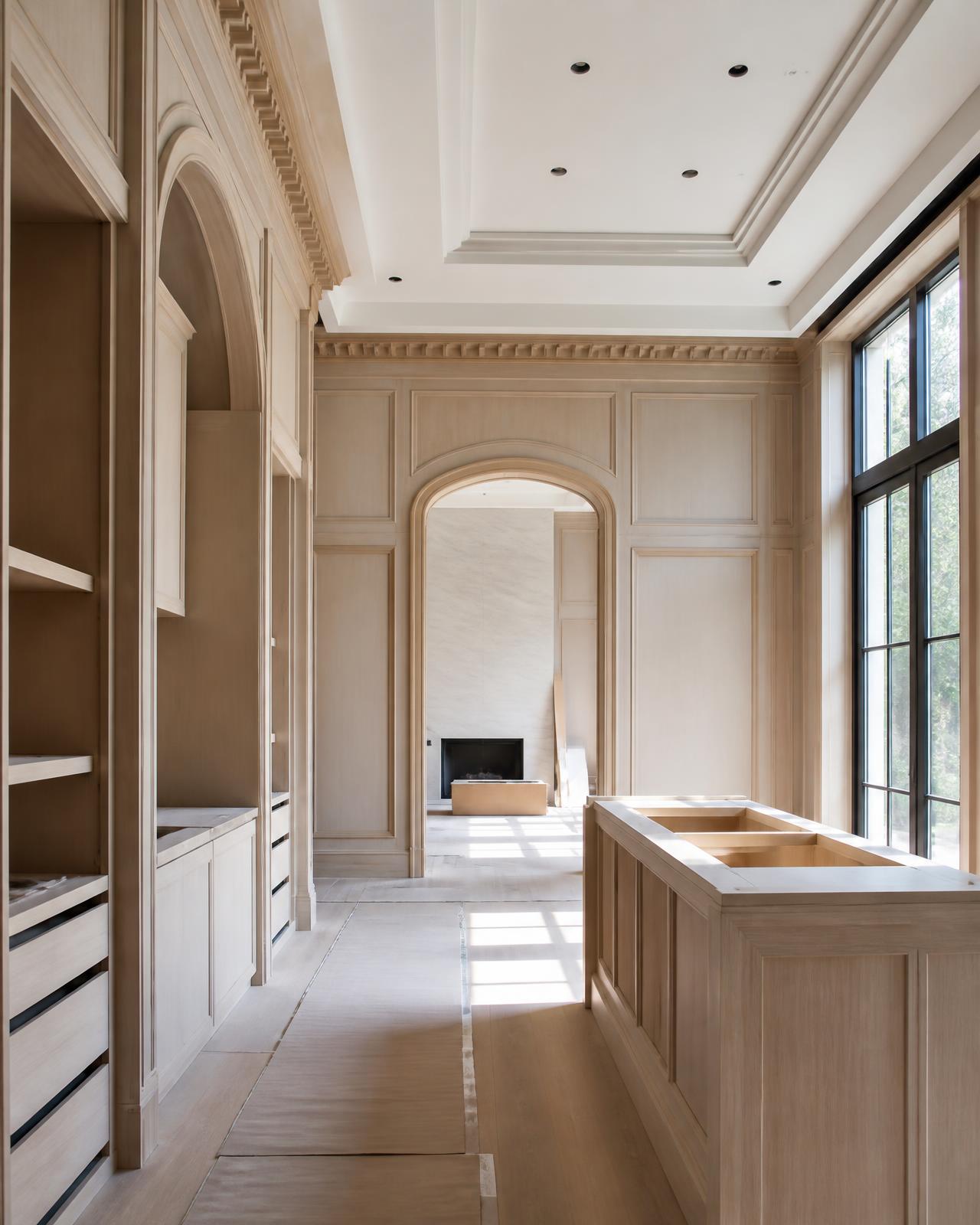Refined interior construction in progress with custom millwork installation